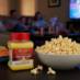Snappy Butter Popcorn Seasoning being used for family movie night