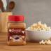 Snappy Barbeque Popcorn Seasoning next to a bowl of popcorn