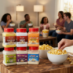 Snappy Popcorn Salts and Savory Popcorn Seasonings being enjoyed at a party