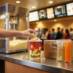 Snappy Snap-Paks used at theater concession stands. Person grabbing a handful of popcorn.