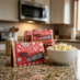 Snappy Movie Theater Popcorn on Kitchen Counter with Bowl of Popcorn