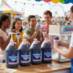 Snappy Grape Sno Cone Syrup being enjoyed at a fair.