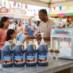 Snappy Root Beer Sno Cone Syrup being enjoyed at a fair.