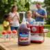 Snappy Watermelon Sno Cone syrup sno cones being enjoyed by people at a fair