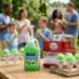 Snappy Green Apple Sno Cones being enjoyed at a backyard party.